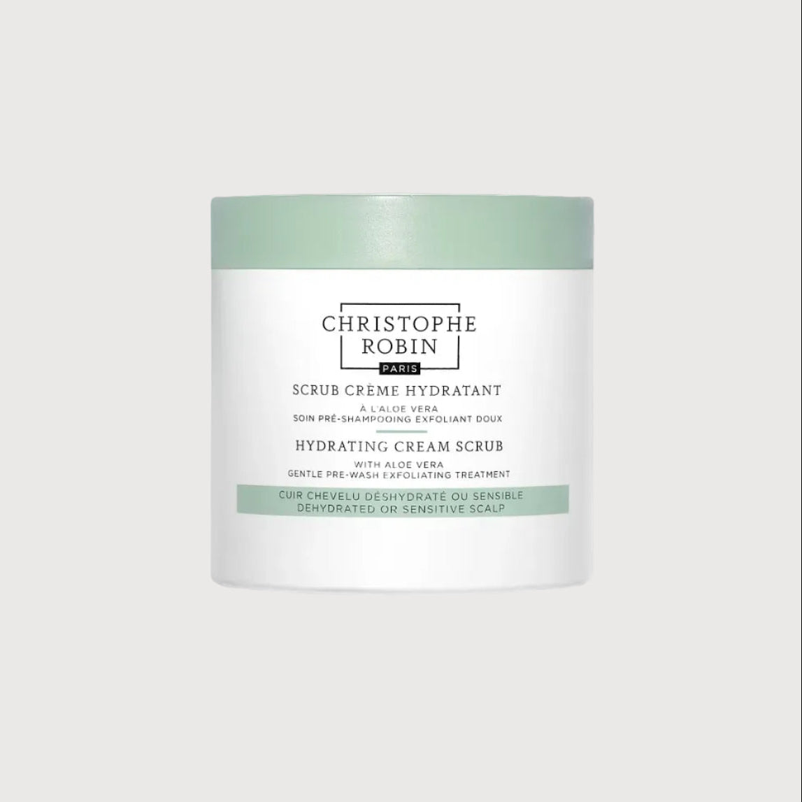 Hydrating cream scrub container with Christophe Robin branding on a white background