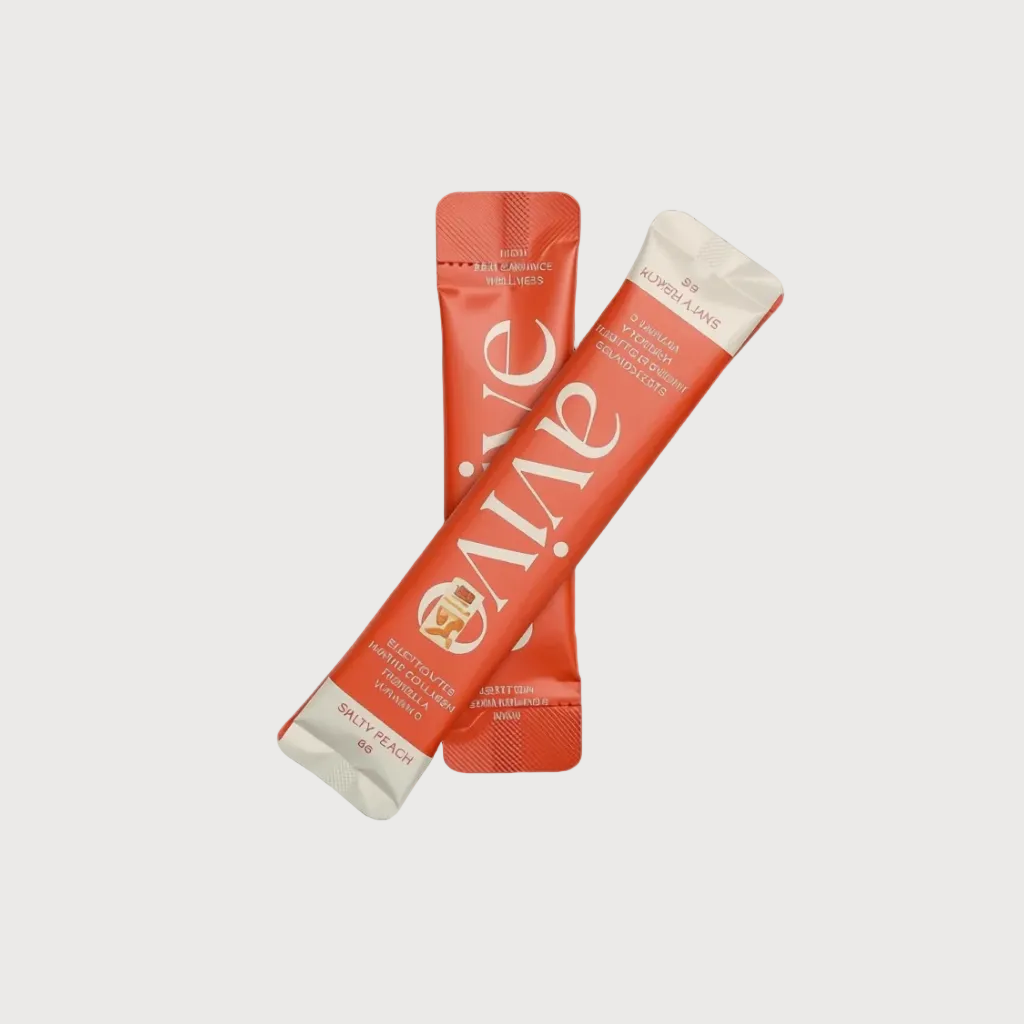 Two orange-red single-serve snack sticks with white and cream ends, crossed over each other on a plain white background. The packaging shows the brand name 'evie' and text including 'SACRIFIÉ' and 'DAILY FLAVORS'.