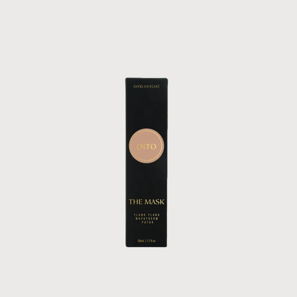 Black box with beige circular design and text on a white background