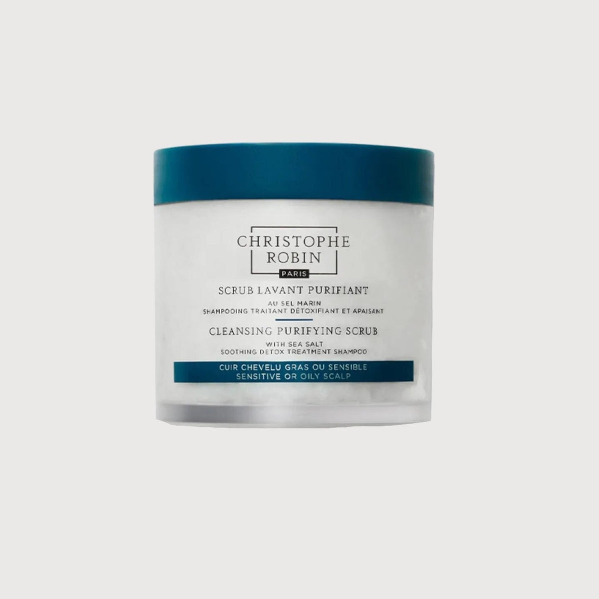 Cleansing purifying scrub container with blue lid on a white background
