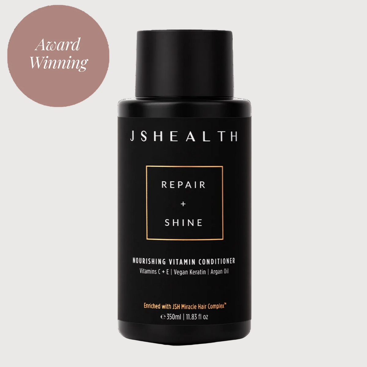JS Health Repair + Shine conditioner bottle on a white background