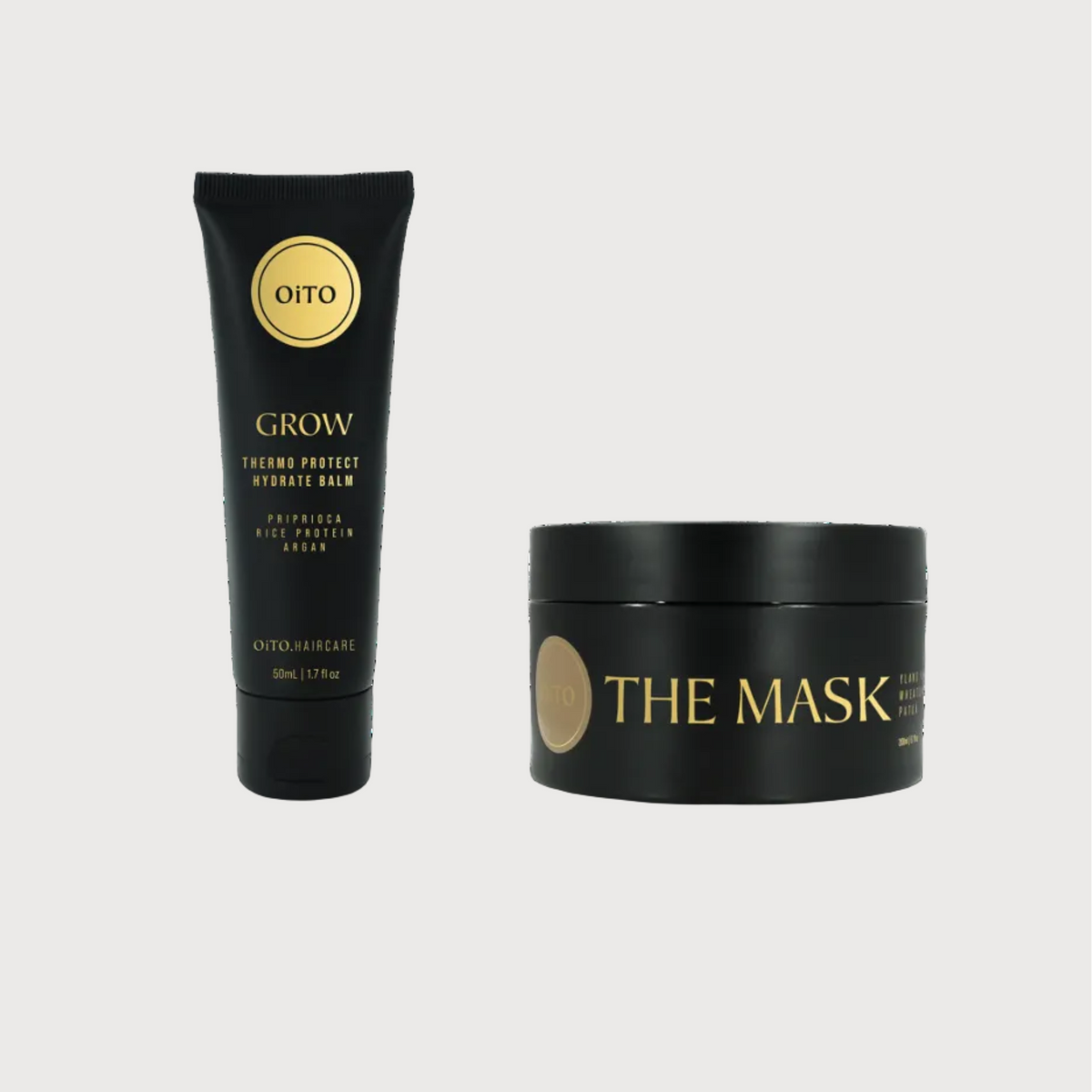 Oito shampoo tube and 'The Mask' jar on a white background