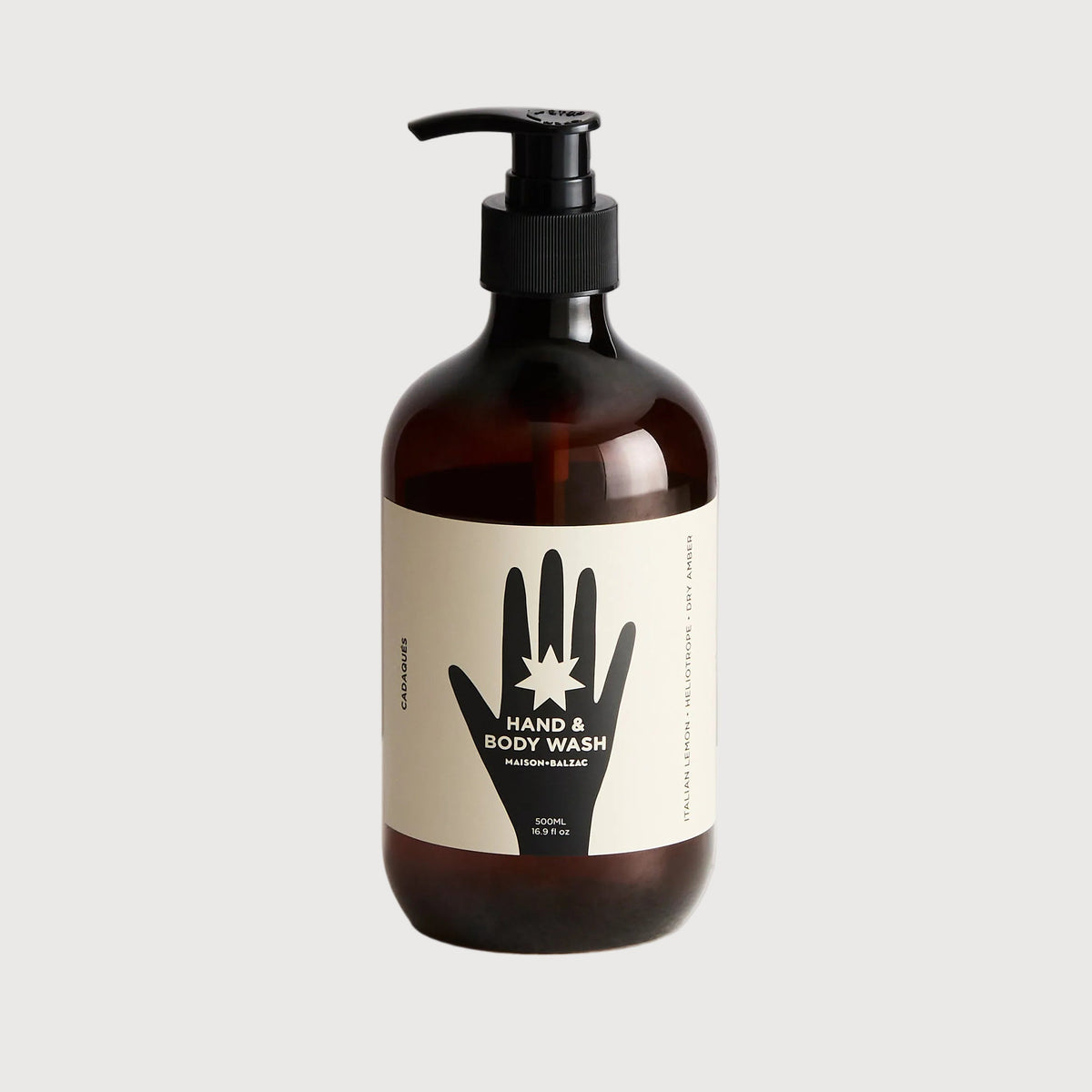 Brown bottle with pump and white label on a light gray background