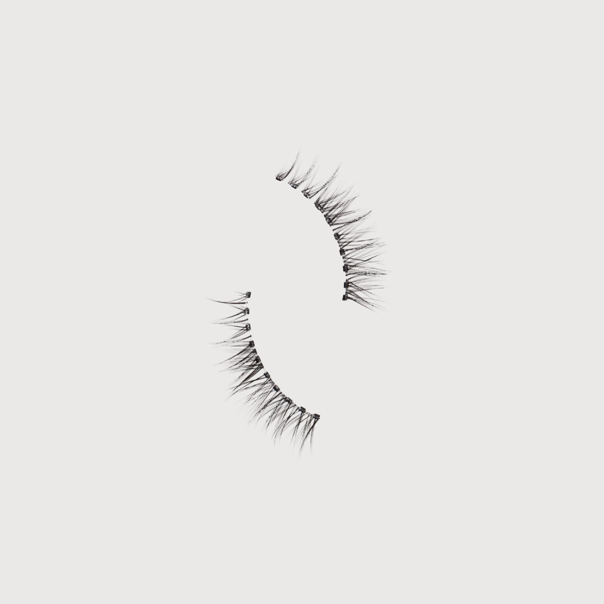 Pair of false eyelashes on a white background