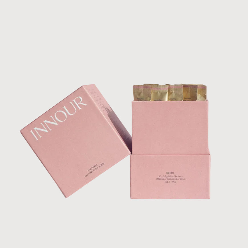 Pink boxes with 'INNOUR' branding on a light gray background