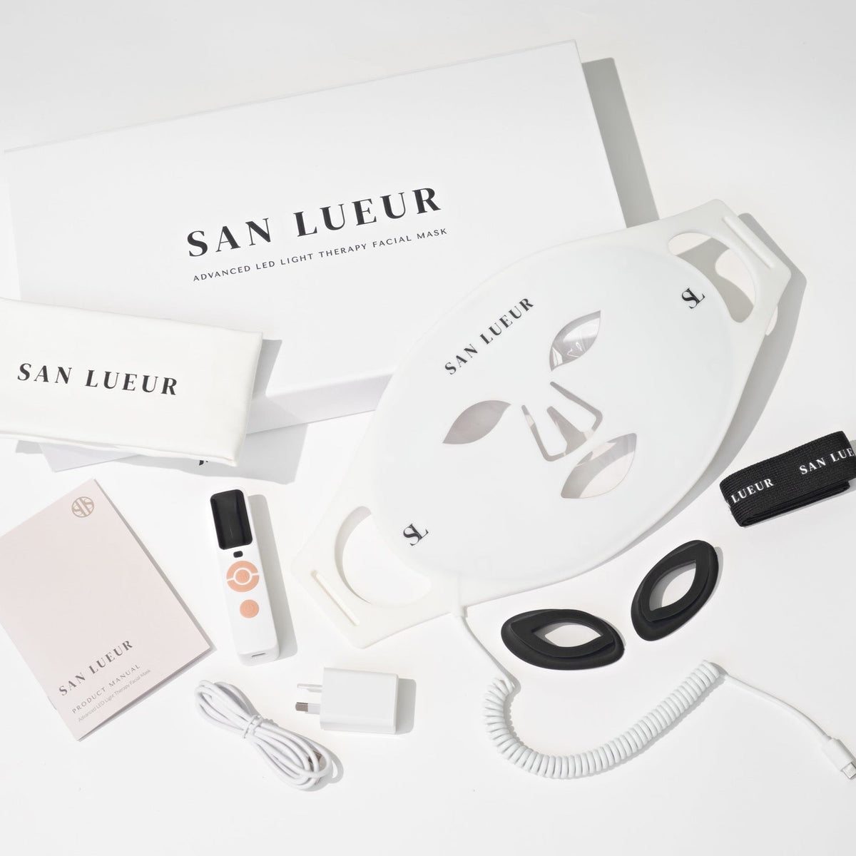 San Lueur LED light therapy facial mask set on a white background