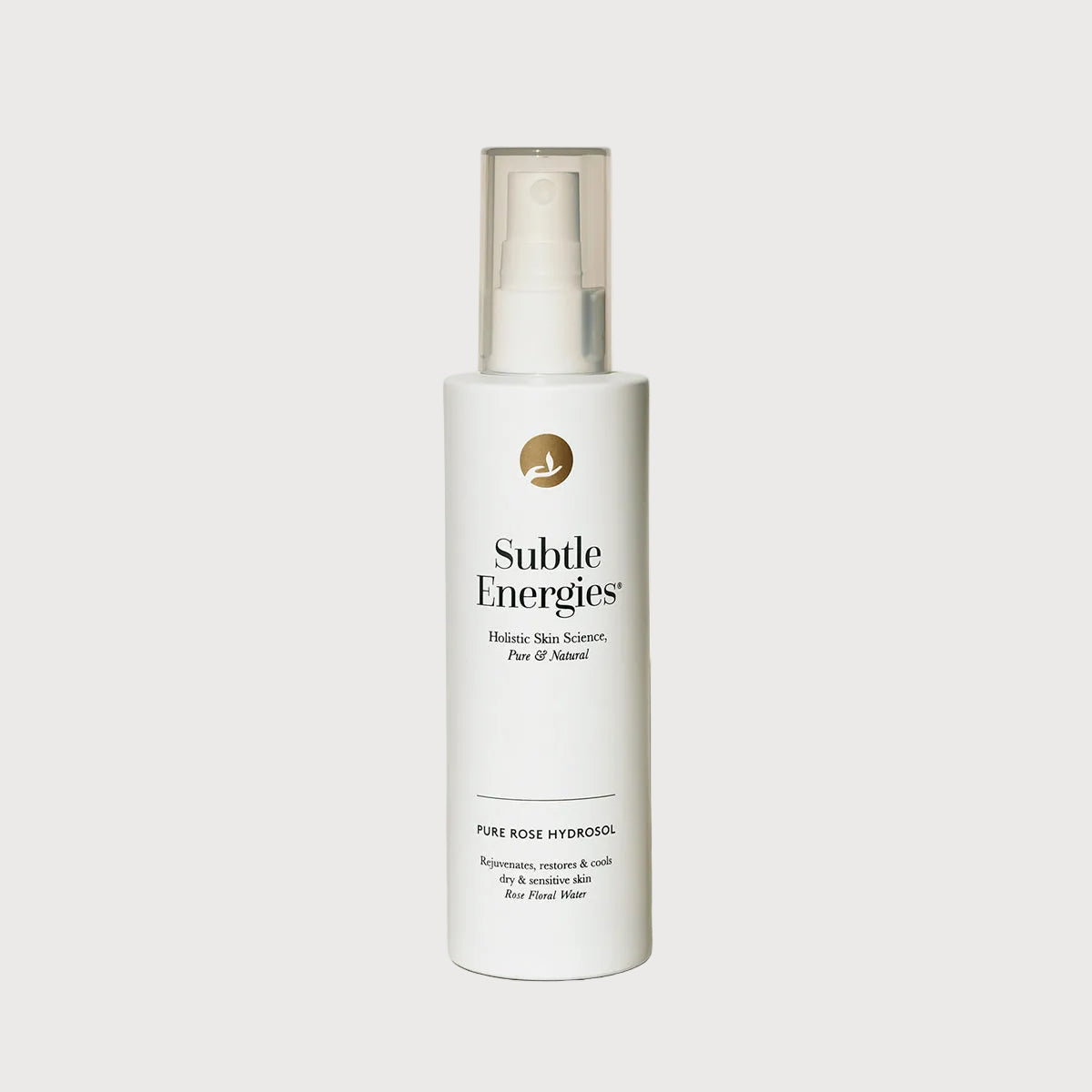 White bottle of Subtle Energies Pure Rose Hydrosol on a light background