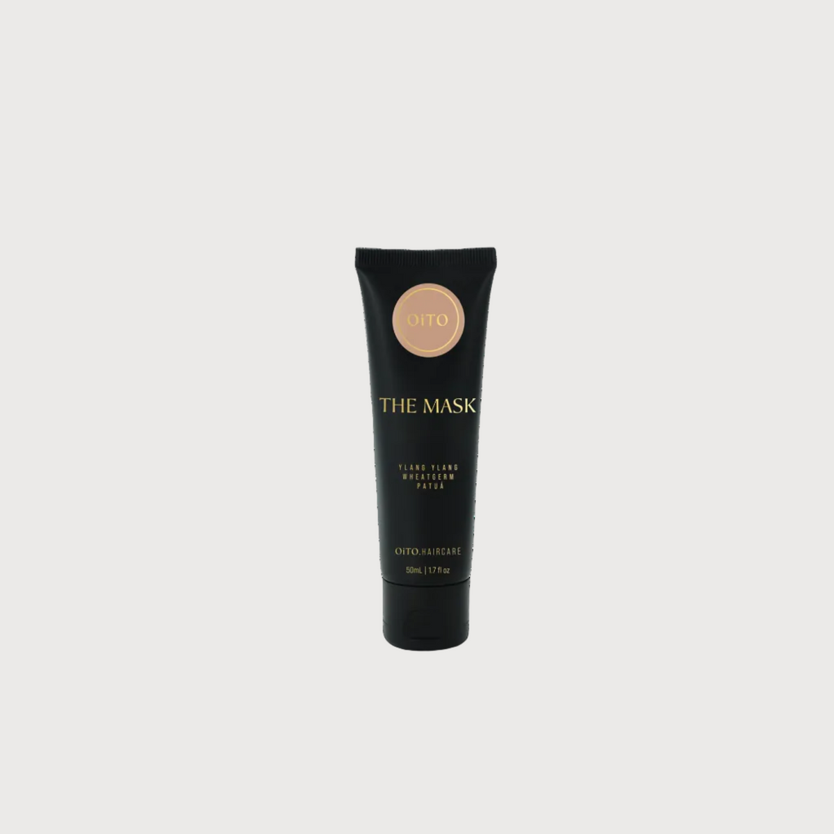 Black tube of 'The Mask' on a white background
