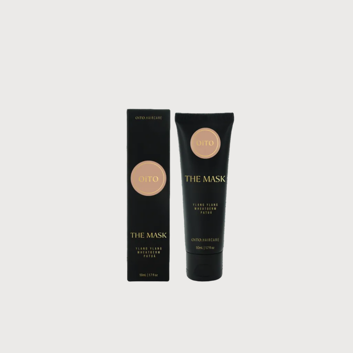 Black tube and packaging of 'The Mask' on a white background