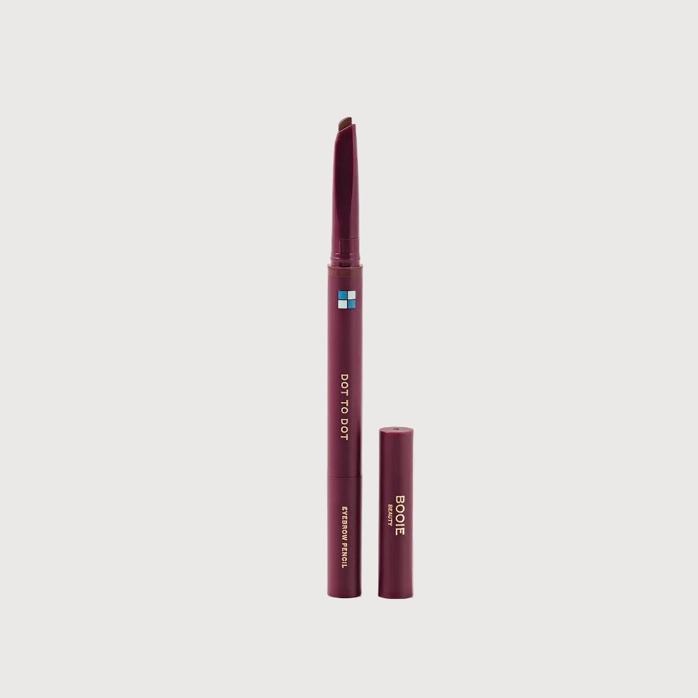 Two lip pencils with 'Dot to Dot' branding on a light pink background