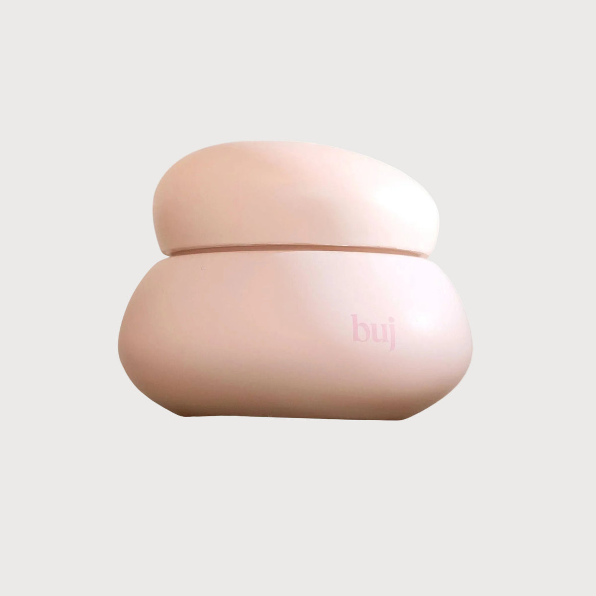 Pink container with buj branding on a grey background