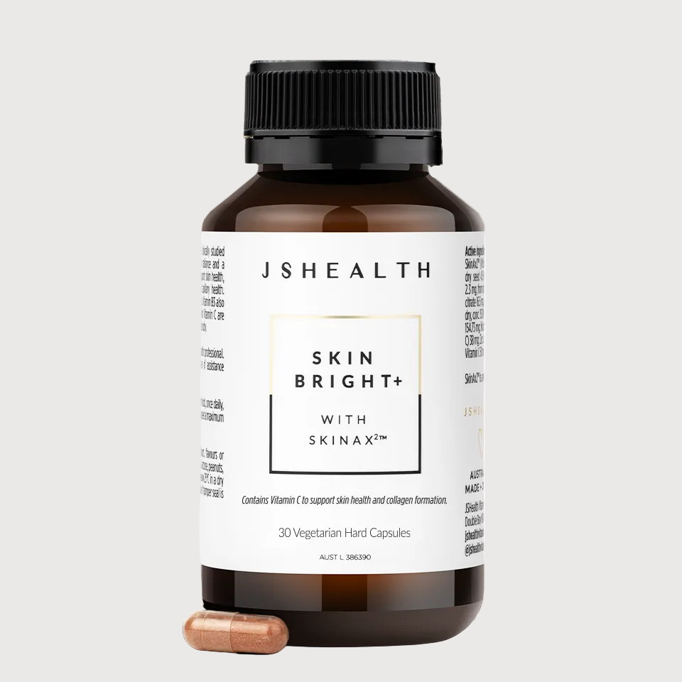 JSHealth Skin Bright+ supplement bottle with a white label on a white background