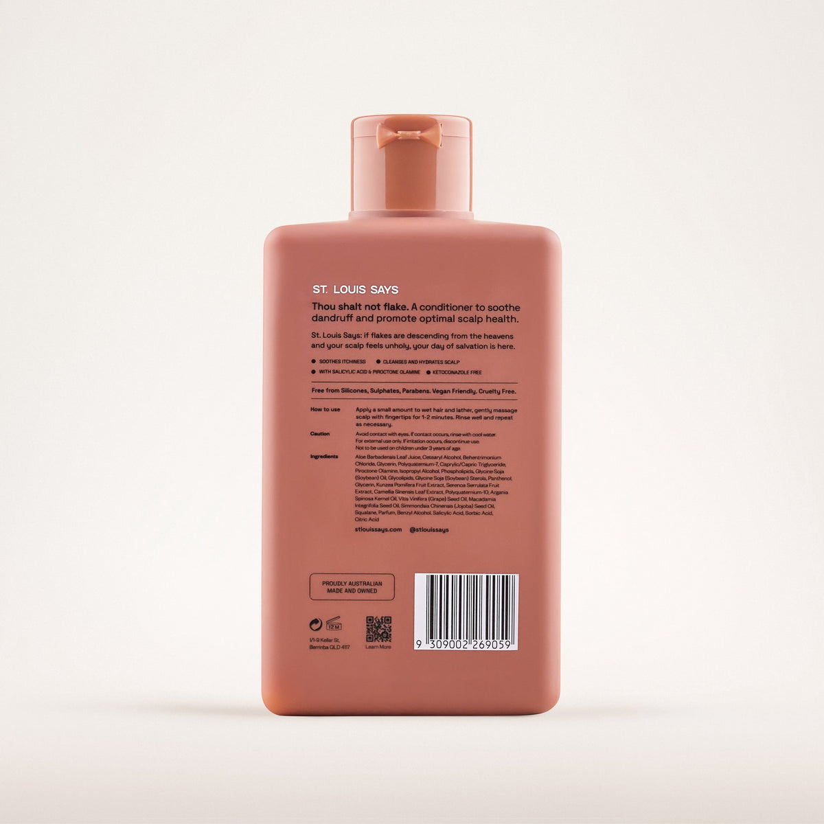 Pink shampoo bottle with label on a white background