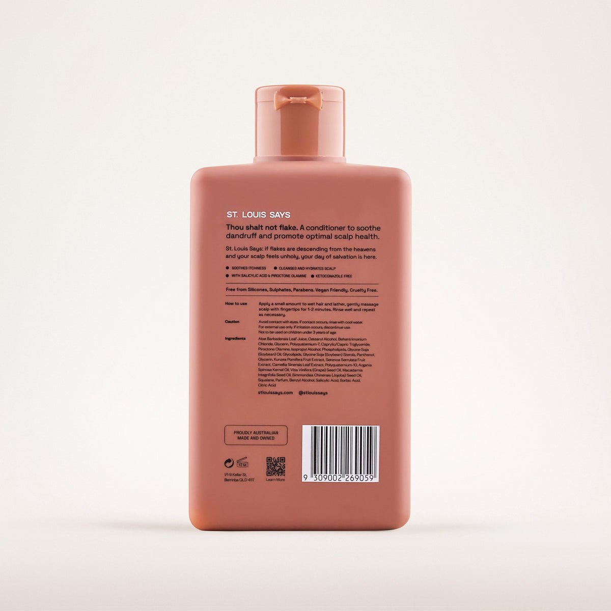 Pink shampoo bottle with label on a white background